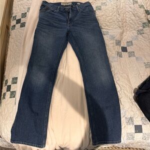 Men’s bootcut Ariat jeans.